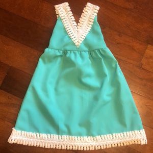 Girls teal and white dress fits size 10/12.
